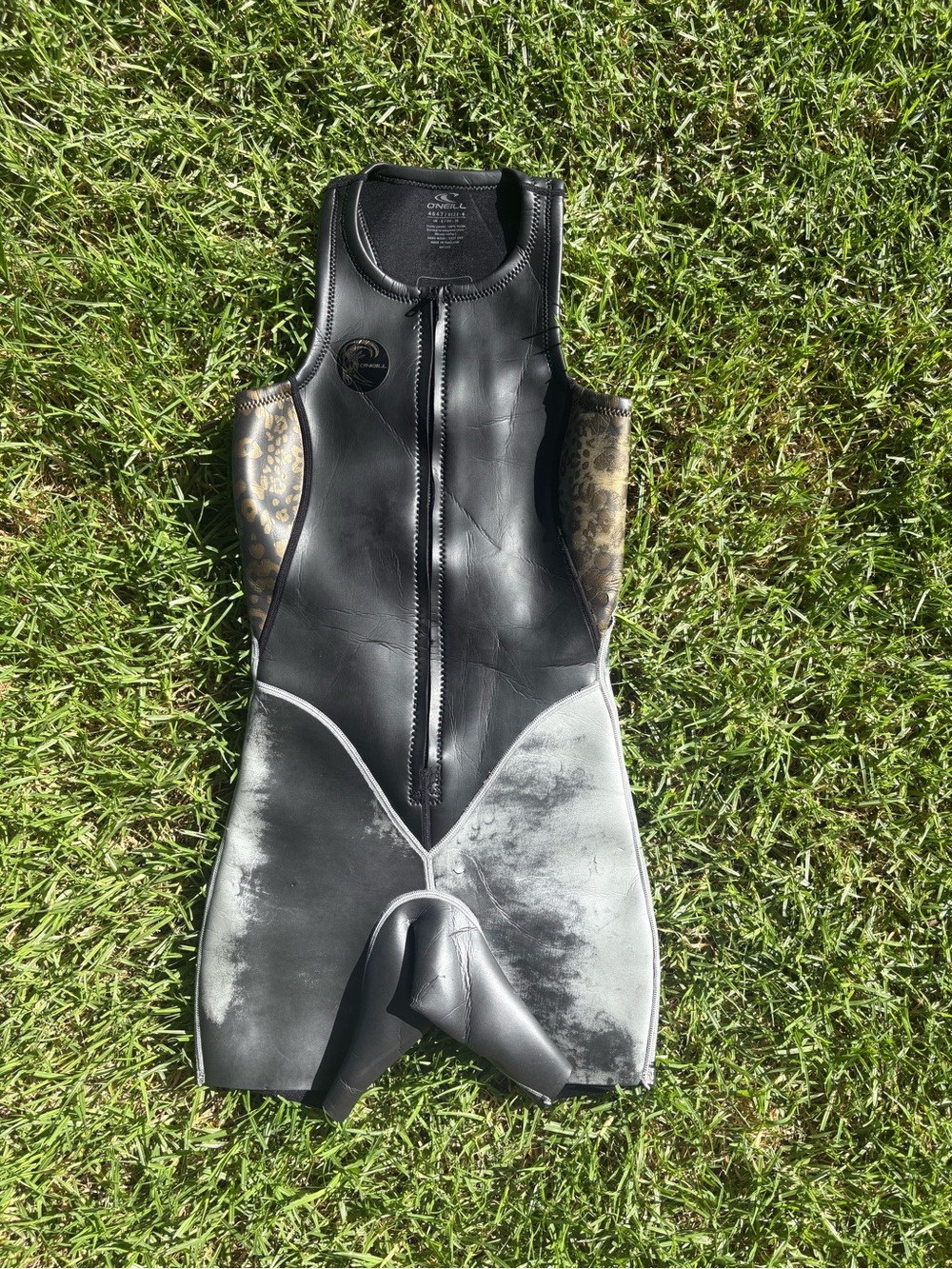 O'Neill Women's Black and Gold Patterned Sleeveless wetsuit
